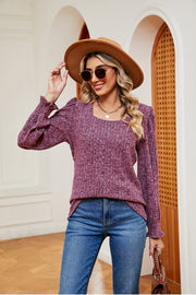 Textured square neck blouse with ruffled cuffs in a heathered plum color.