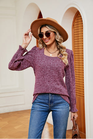 Textured square neck blouse with ruffled cuffs in a heathered plum color.