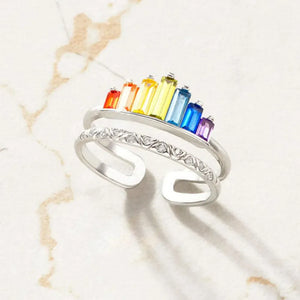 Silver stacked ring set with rainbow baguette crystals and diamond accents