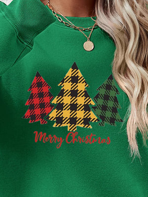 Green crewneck sweatshirt with plaid Christmas trees and Merry Christmas text.