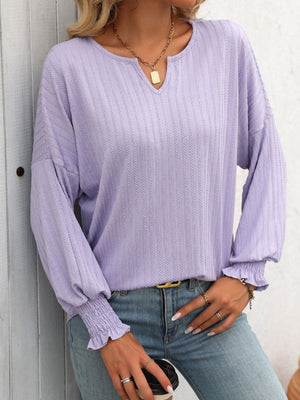 Lilac textured sleeve blouson top with v-neck and smocked cuffs