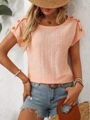Shoulder button eyelet knit tee in pink, breathable, casual.