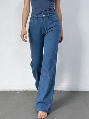 Light blue maternity jeans with high waist and wide leg.
