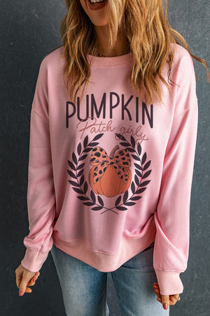 Pink graphic sweatshirt with pumpkin patch girly print and leopard bow detail