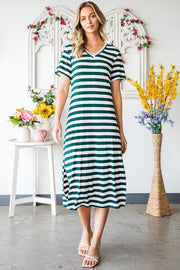 Green and white striped jersey maxi dress with short sleeves and a slit hem.