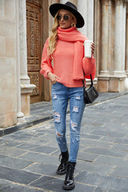 Strawberry balloon sleeve ribbed knit sweater with matching scarf, worn with distressed jeans.