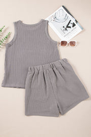 Textured ribbed tank and shorts set in dark gray with vertical stripes.
