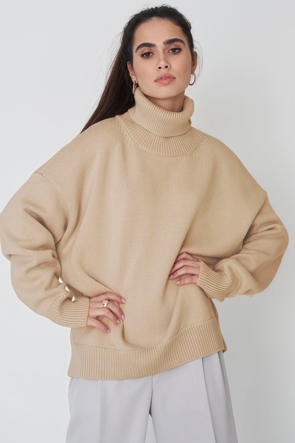 Relaxed roll-neck sweater in Khaki, boxy knit with ribbed cuffs and hem.