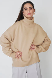 Relaxed roll-neck sweater in Khaki, boxy knit with ribbed cuffs and hem.