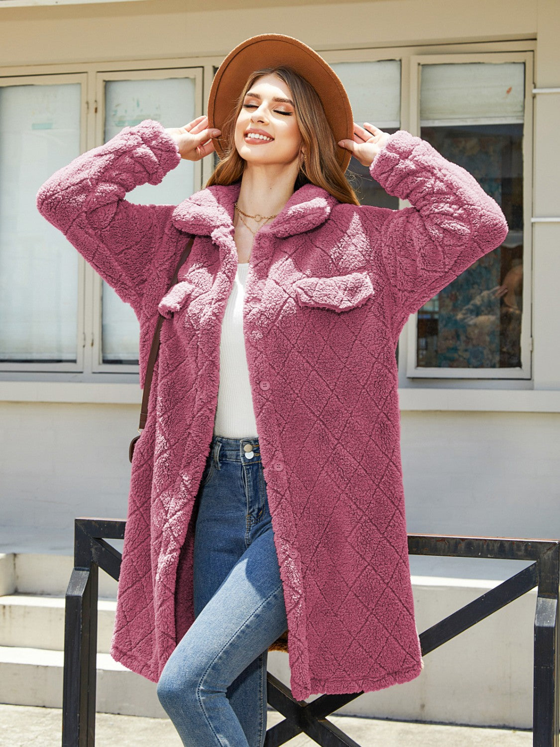 Quilted teddy bear coat in hot pink with patch pockets and button front.