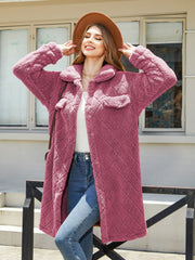 Quilted teddy bear coat in hot pink with patch pockets and button front.