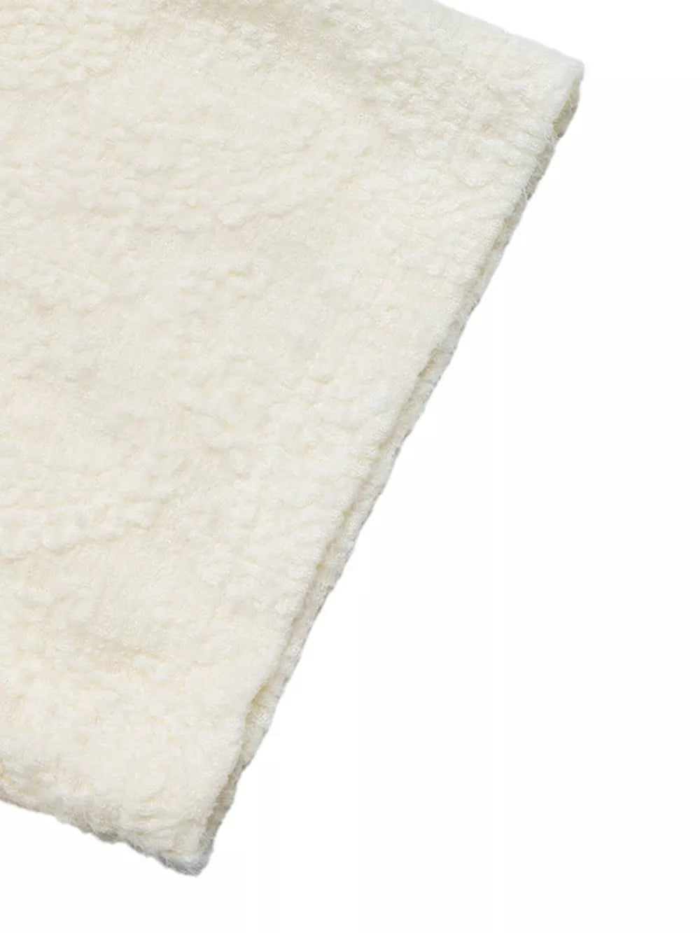 Cream textured casual t-shirt with a fuzzy, sherpa-like fabric detail.