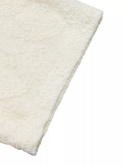 Cream textured casual t-shirt with a fuzzy, sherpa-like fabric detail.