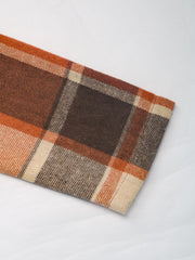 Autumnal plaid tailored blazer in ochre with brown, orange, and cream checks.