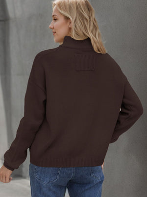 Coffee brown acrylic knit cardigan with stand collar and textured detail.