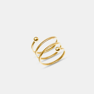 Gold spiral orb ring with twisted detail and smooth bands