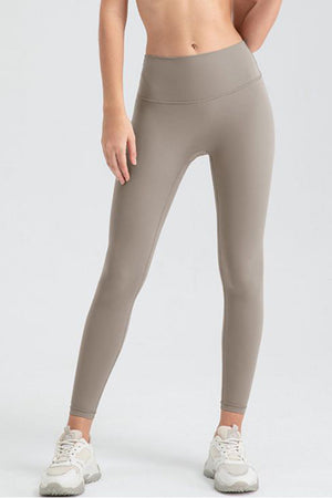Women's high-waisted leggings in Khaki with a sculpted fit.