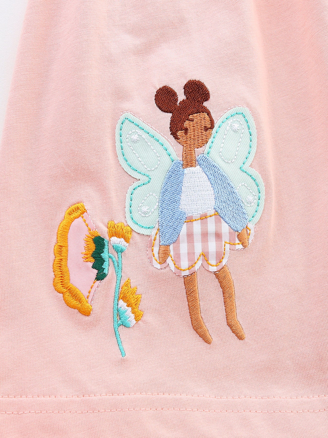 Pink cotton toddler dress with fairy and flower appliqué detail