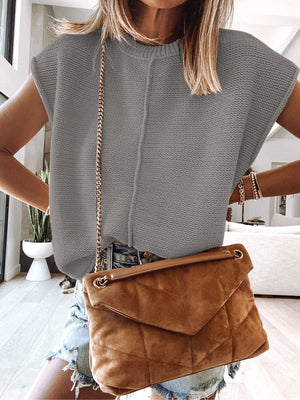 Charcoal knit tank top with center seam and crew neck, styled with denim shorts and a brown crossbody bag.