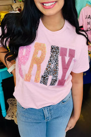 Pink cotton t-shirt with sequin and leopard print PRAY graphic patch detail.