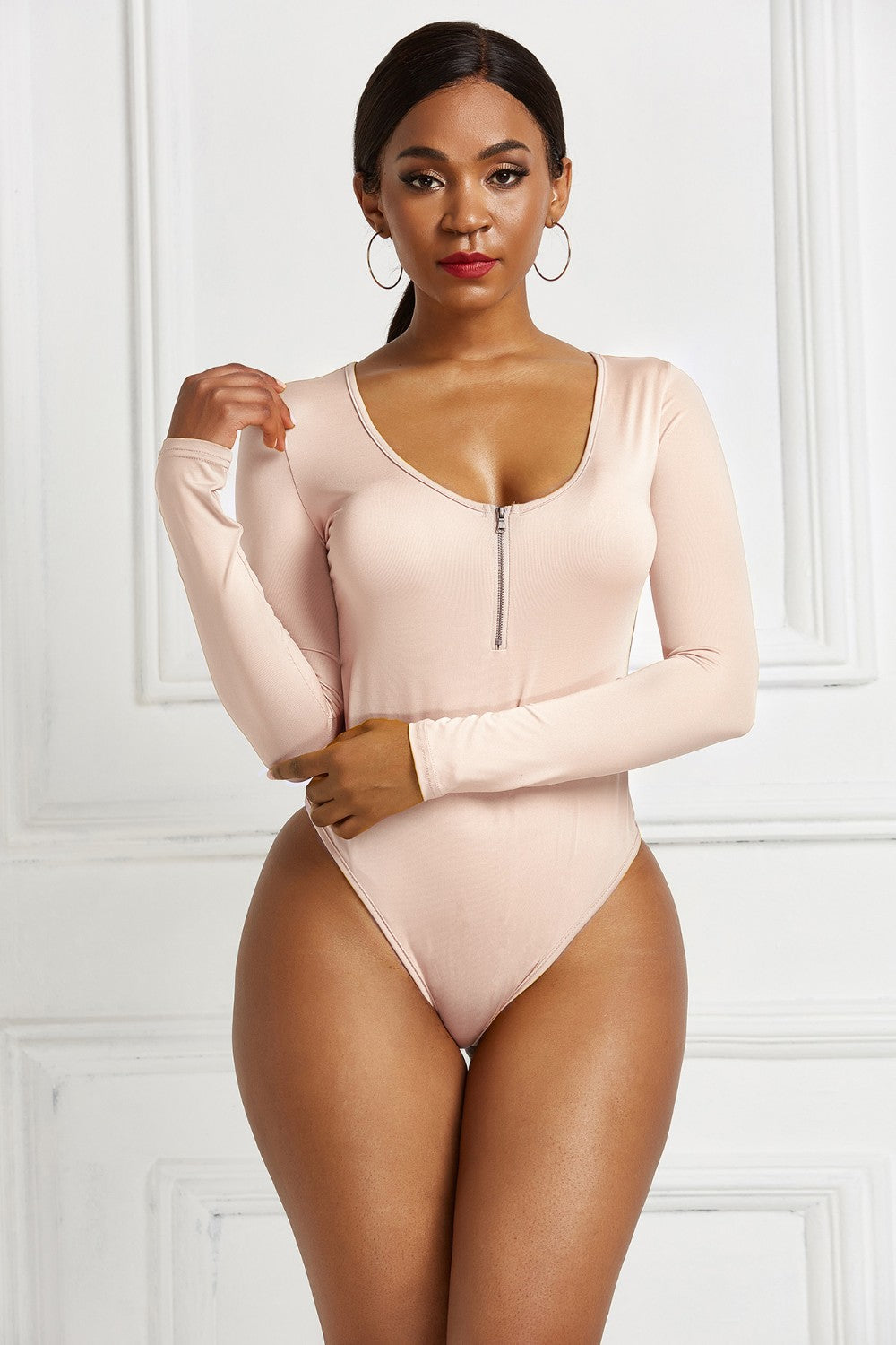 Dusty Pink long sleeve bodysuit with plunge neckline and zip front.