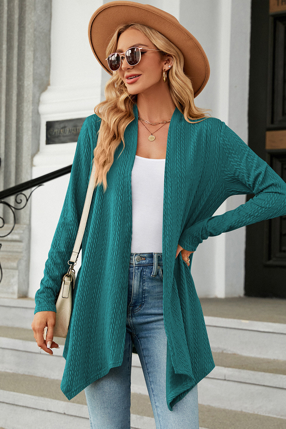 Turquoise textured knit cardigan with asymmetrical drape front and long sleeves.