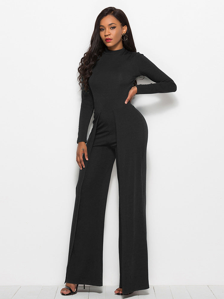 Black high-waisted palazzo jumpsuit with long sleeves and a slit front.