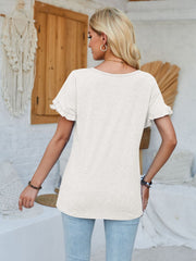 White t-shirt with flutter sleeves and a rounded neckline.