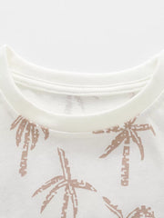 Toddler white cotton blend t-shirt with tropical palm print and crew neck.