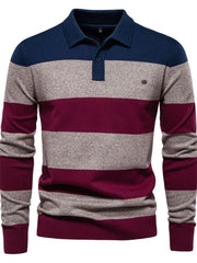 Colorblock knit polo with ribbed collar in navy, gray, and burgundy stripes.
