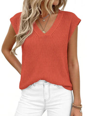 Textured apricot V-neck sweater vest with cap sleeves.