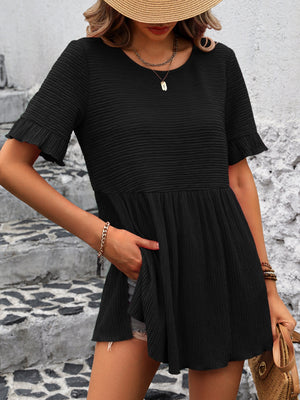 Black textured babydoll blouse with flutter sleeves and a tiered skirt.