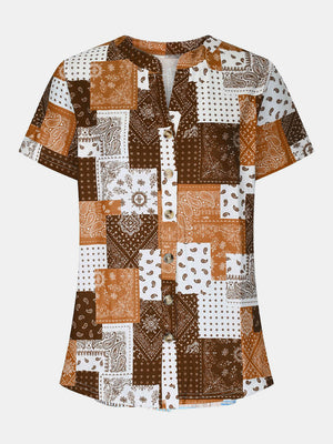 Bandana patchwork henley blouse with short sleeves and a button-up placket in brown and white.