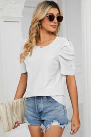 White perforated sleeve volume top with round neckline
