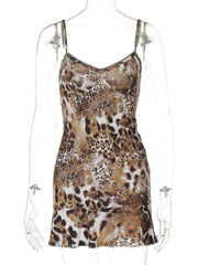 Leopard print cami and skirt set with lace trim and ruffled hem.