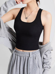 Black sculpted back crop tank with a scoop neckline and racerback detail.