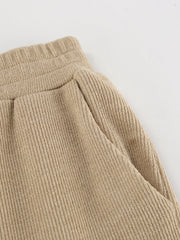 Beige knit pants with pockets and elastic waistband
