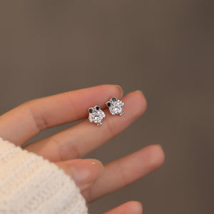 Sterling owl stud earrings with clear and black stones.