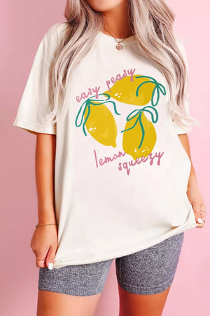 Cream polyester t-shirt with a graphic of three lemons and the text "easy peasy lemon squeezy".