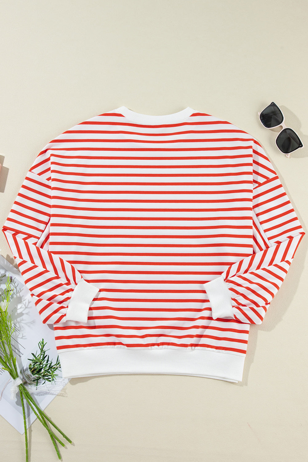 Chevron-Inset Stripe Sweatshirt in red and white horizontal stripes with crew neck and white cuffs.