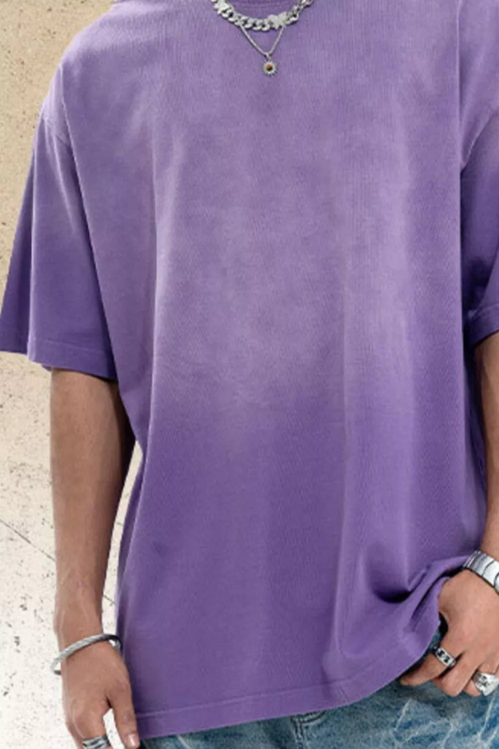 Men's purple oversized cotton t-shirt with a faded wash and crew neck.