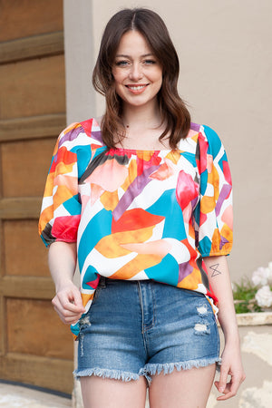 Abstract print puff sleeve blouse with a square neckline in multicolor.