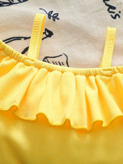 Bright yellow ruffled baby top with thin straps and a ribbed texture.
