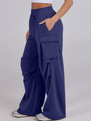 Royal Blue cargo pocket drape wide leg sweatpants with elastic waistband and side pockets.