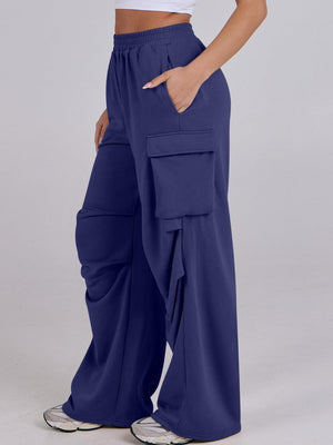 Royal Blue cargo pocket drape wide leg sweatpants with elastic waistband and side pockets.
