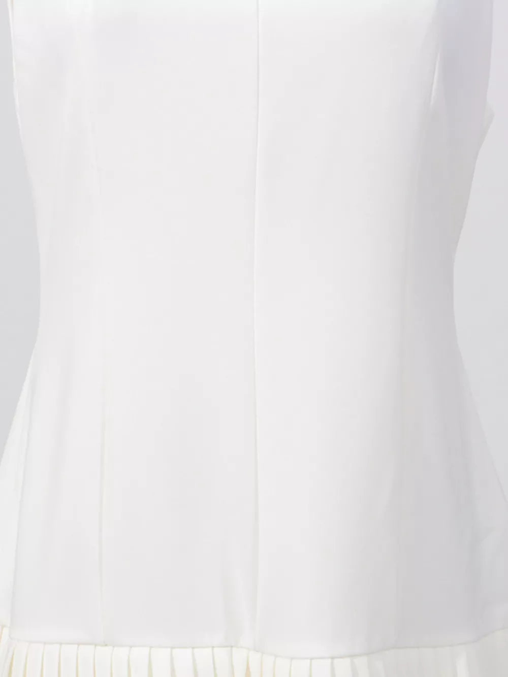 White mini dress with square neckline and pleated hem detail