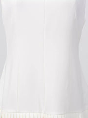 White mini dress with square neckline and pleated hem detail