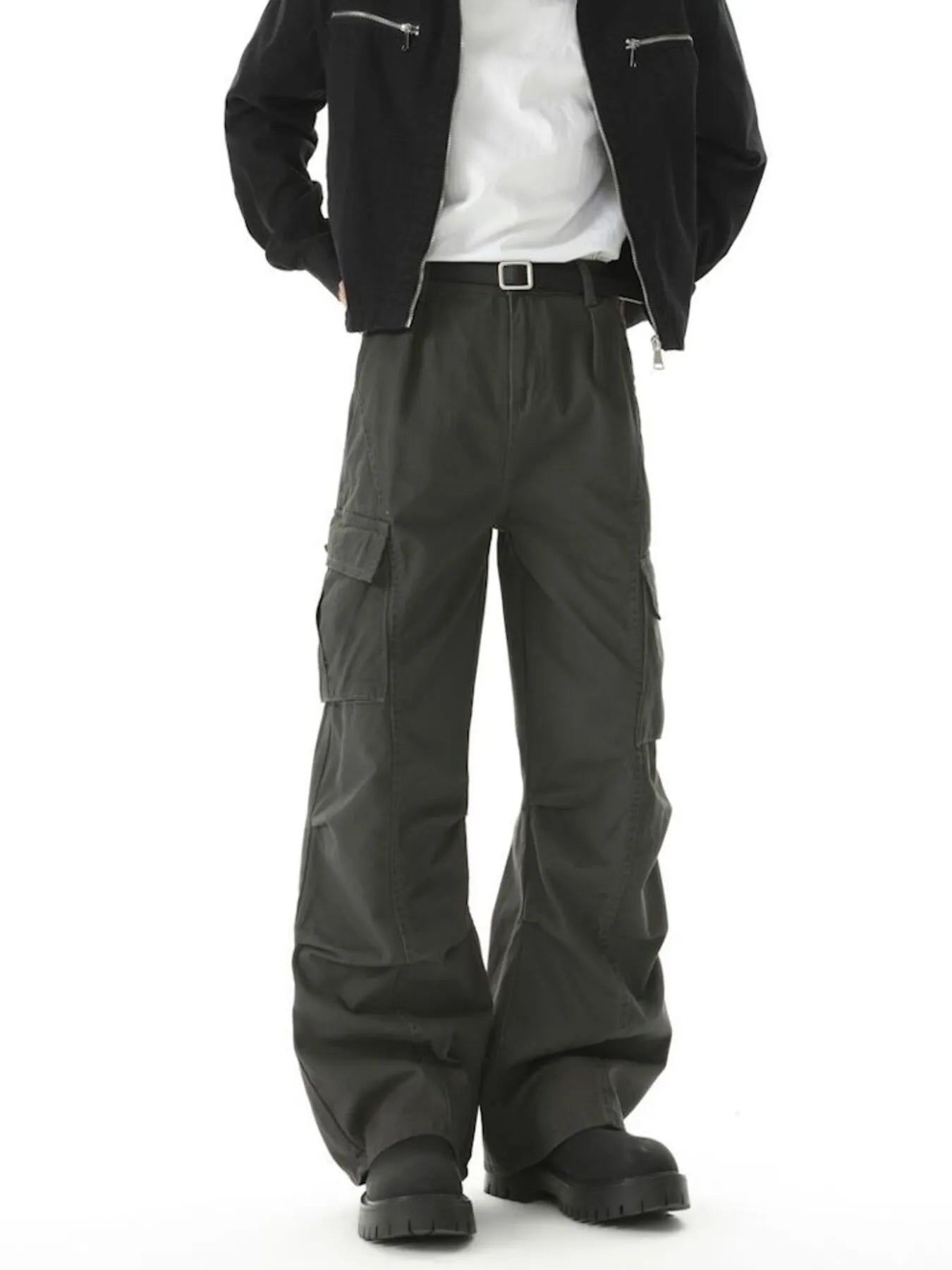 Relaxed fit utility cargo pants in dark gray with multiple pockets and a belted waist.