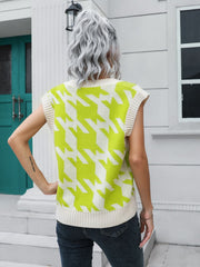 Houndstooth knit v-neck pullover vest in lime and cream acrylic with ribbed trim.