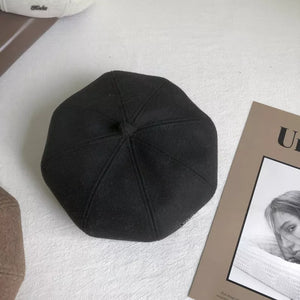 Black woolen beret with distinct paneled design